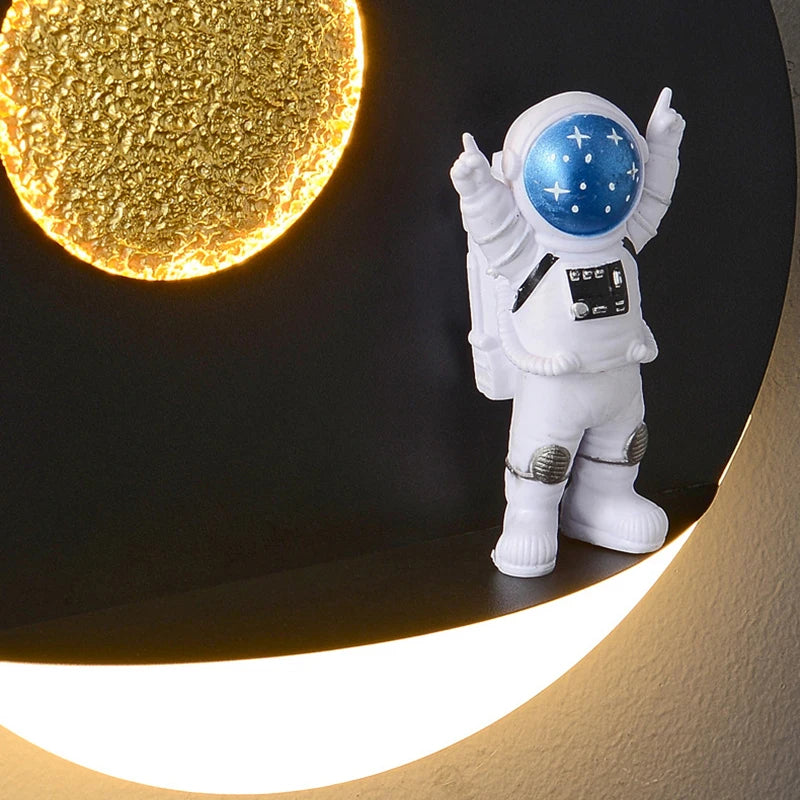 3D Astronaut Models with Moon Wall Sconce