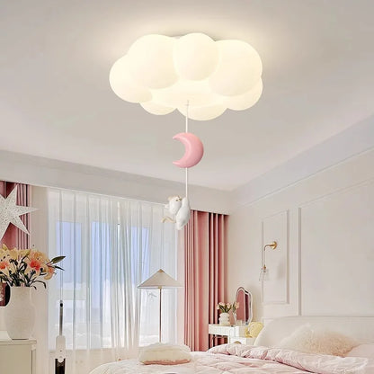 Kitten Hanging From Cloud Ceiling Light